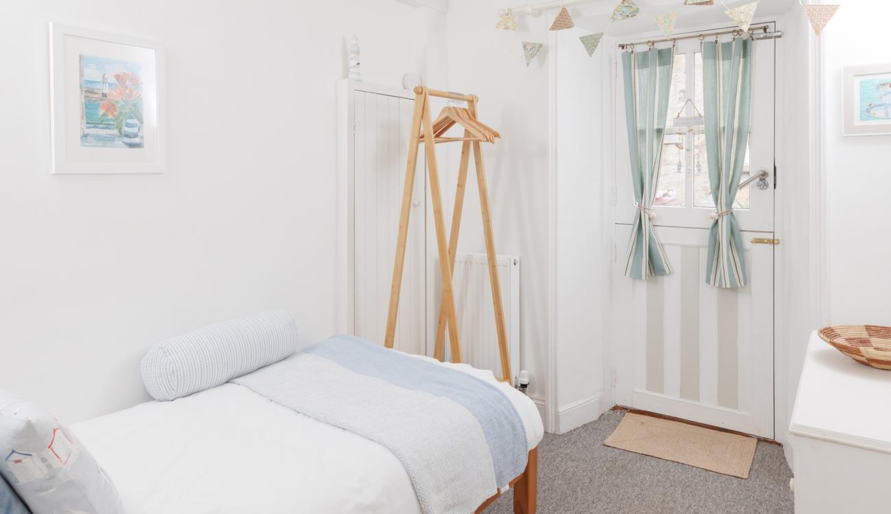 The single bedroom is ideal for an adult or child.