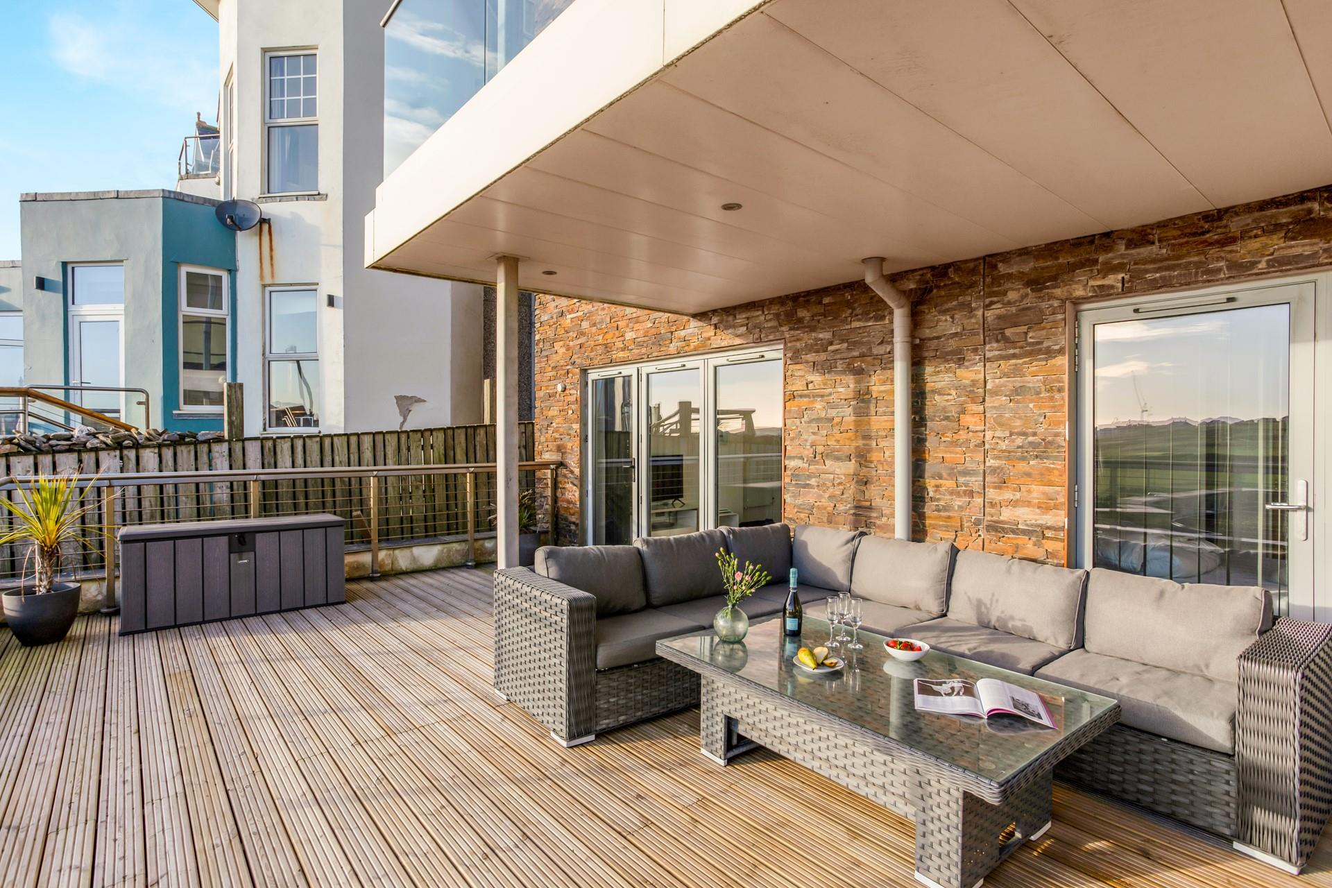 The seaside terrace offers the chance to kick back and relax in the sun whilst watching the sea.