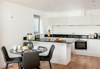 The open plan kitchen is a sociable space, perfect for catching up with the family whilst preparing dinner. 