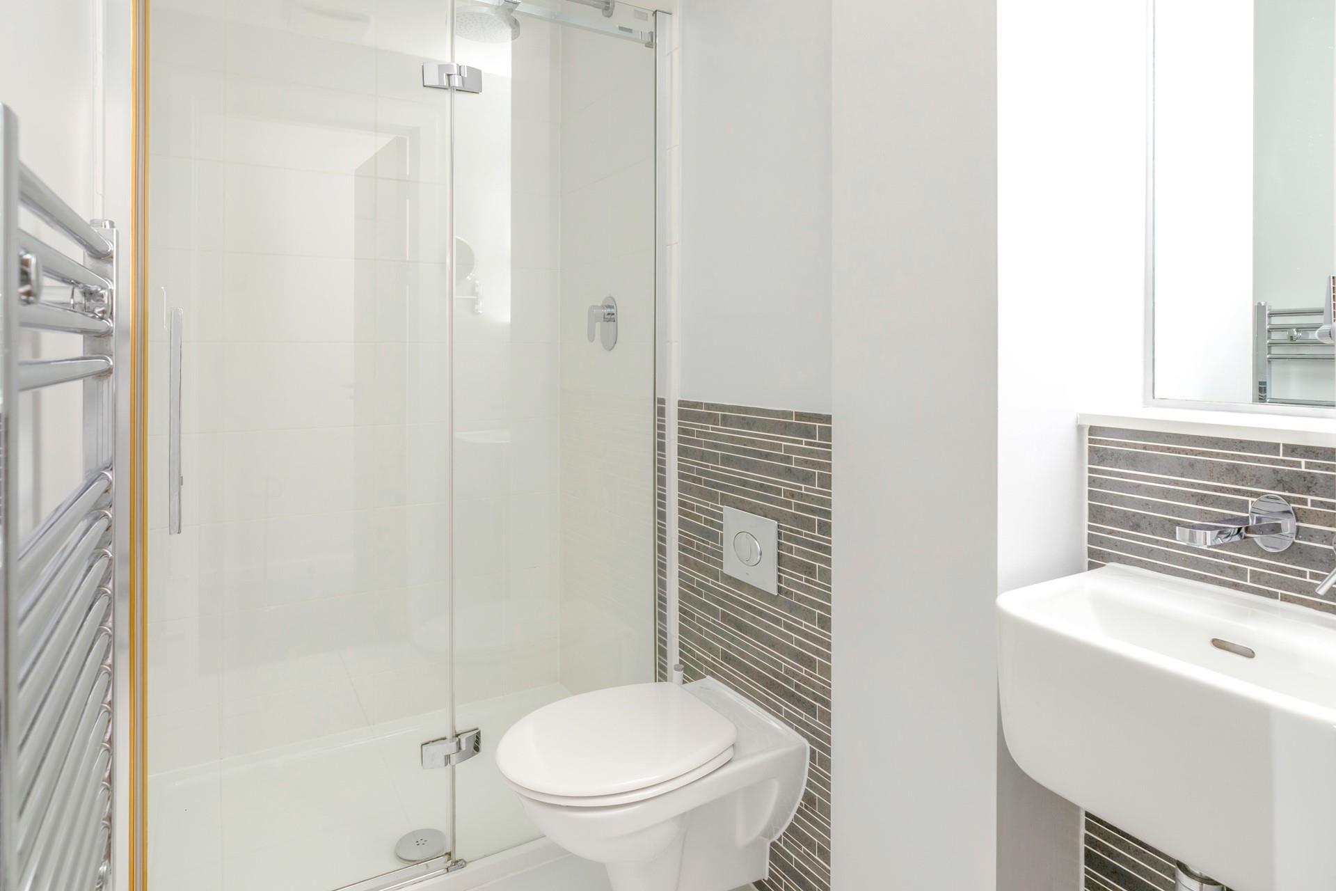 The spacious family bathroom is just the ticket for freshening up or running a relaxing bath at the end of the day.