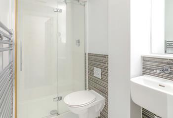 The spacious family bathroom is just the ticket for freshening up or running a relaxing bath at the end of the day.