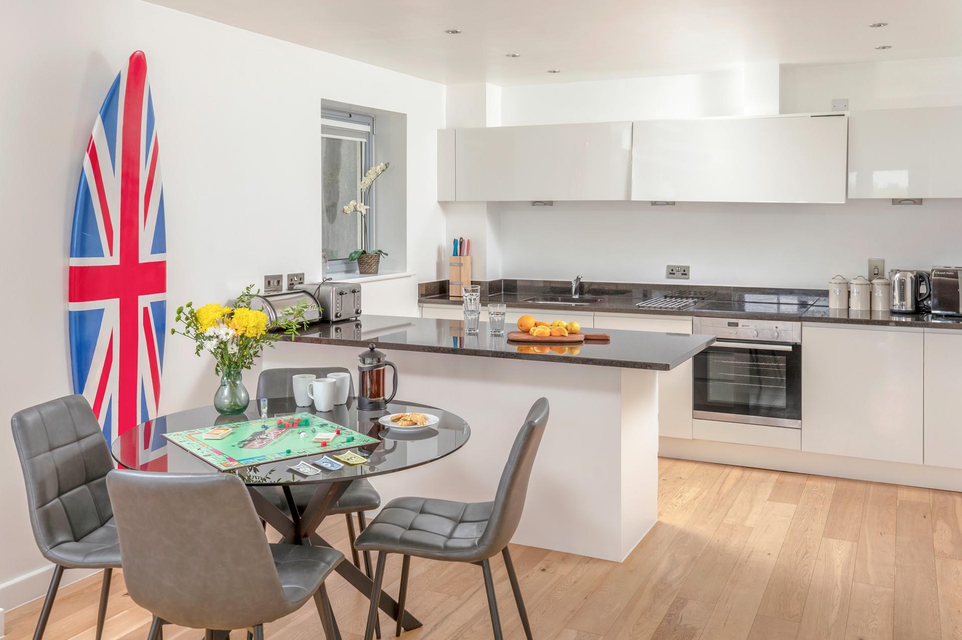 The open plan kitchen is a sociable space, perfect for catching up with the family whilst preparing dinner. 