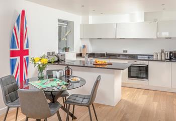 The open plan kitchen is a sociable space, perfect for catching up with the family whilst preparing dinner. 