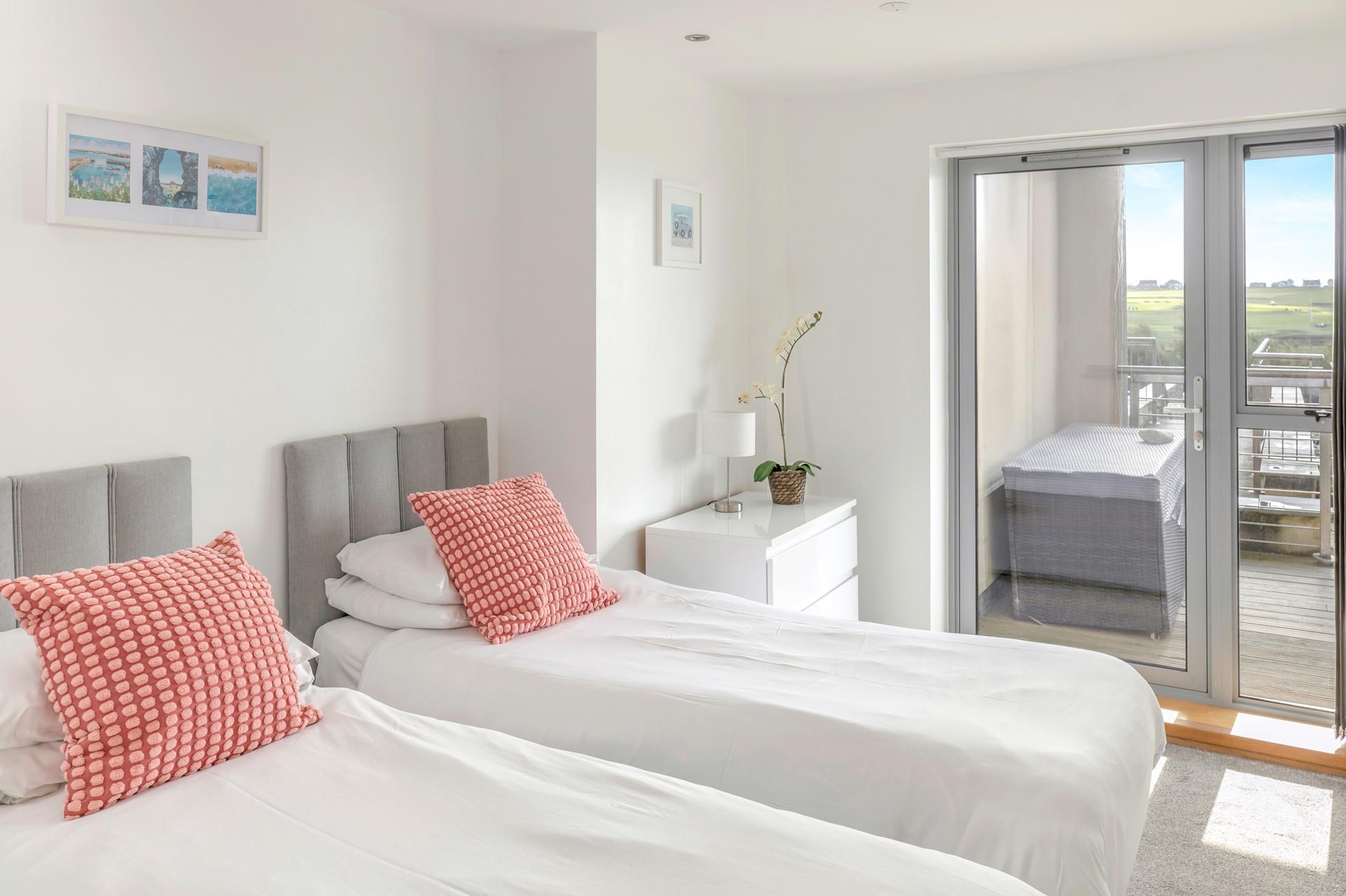 Bedroom 2 benefits from zip and link beds that can be made as king size or twin beds, ideal for both couples and children. 