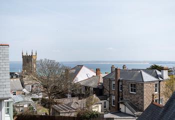 Gaze out over the iconic St Ives rooftops to the sea glistening in the distance. 