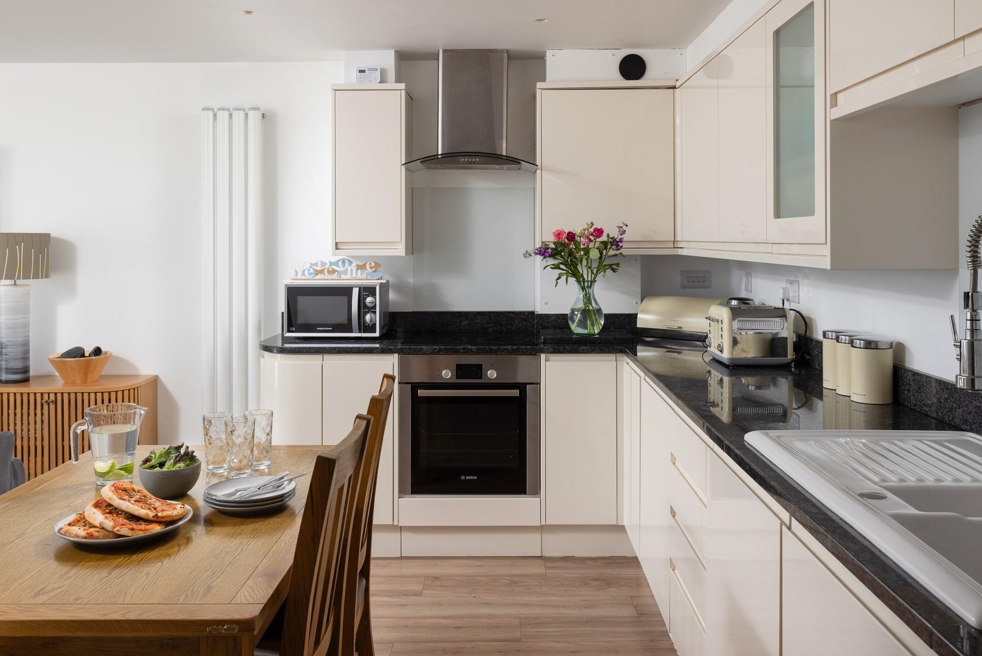 The kitchen is well-equipped for cooking tasty meals.