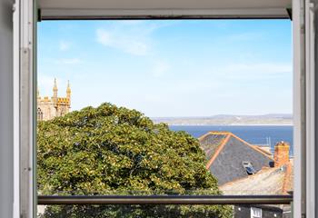 The view from the balcony sweeps across St Ives Bay.
