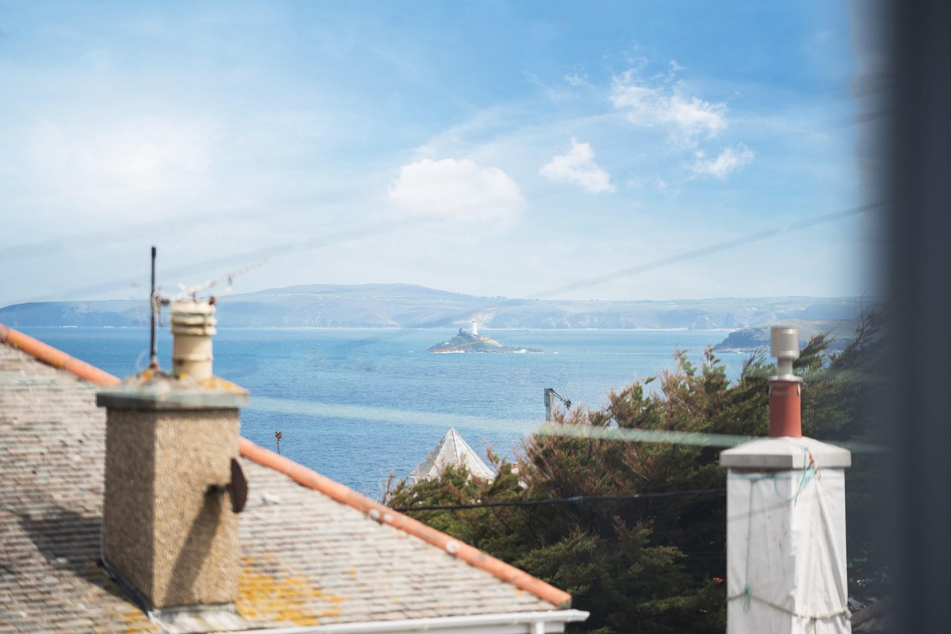 Enjoy glimpses of Godrevy Lighthouse and the dramatic coastline.