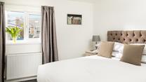 Snuggle into bed and drift off for a blissful night's sleep on the soft bed sheets.