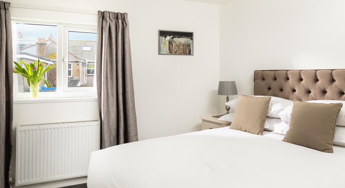 Snuggle into bed and drift off for a blissful night's sleep on the soft bed sheets.