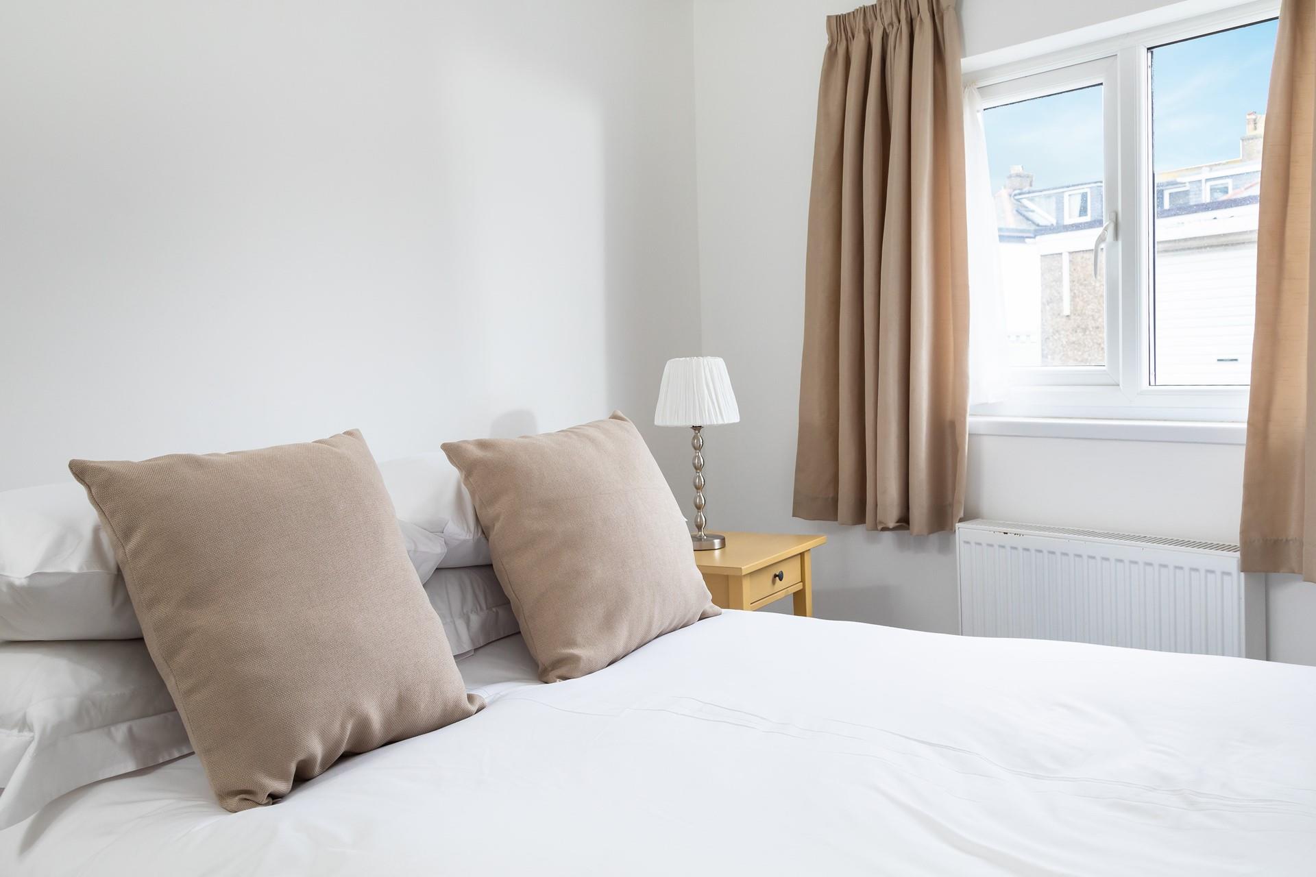 After spending the day relaxing on the beach, come back to snuggle into bed.