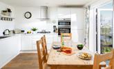 Sleek yet cosy the kitchen and dining space.  - Thumbnail Image
