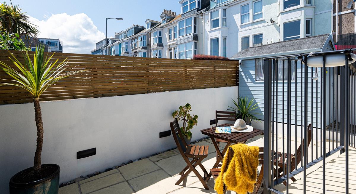 Open a bottle of wine to sip as the sun goes down.