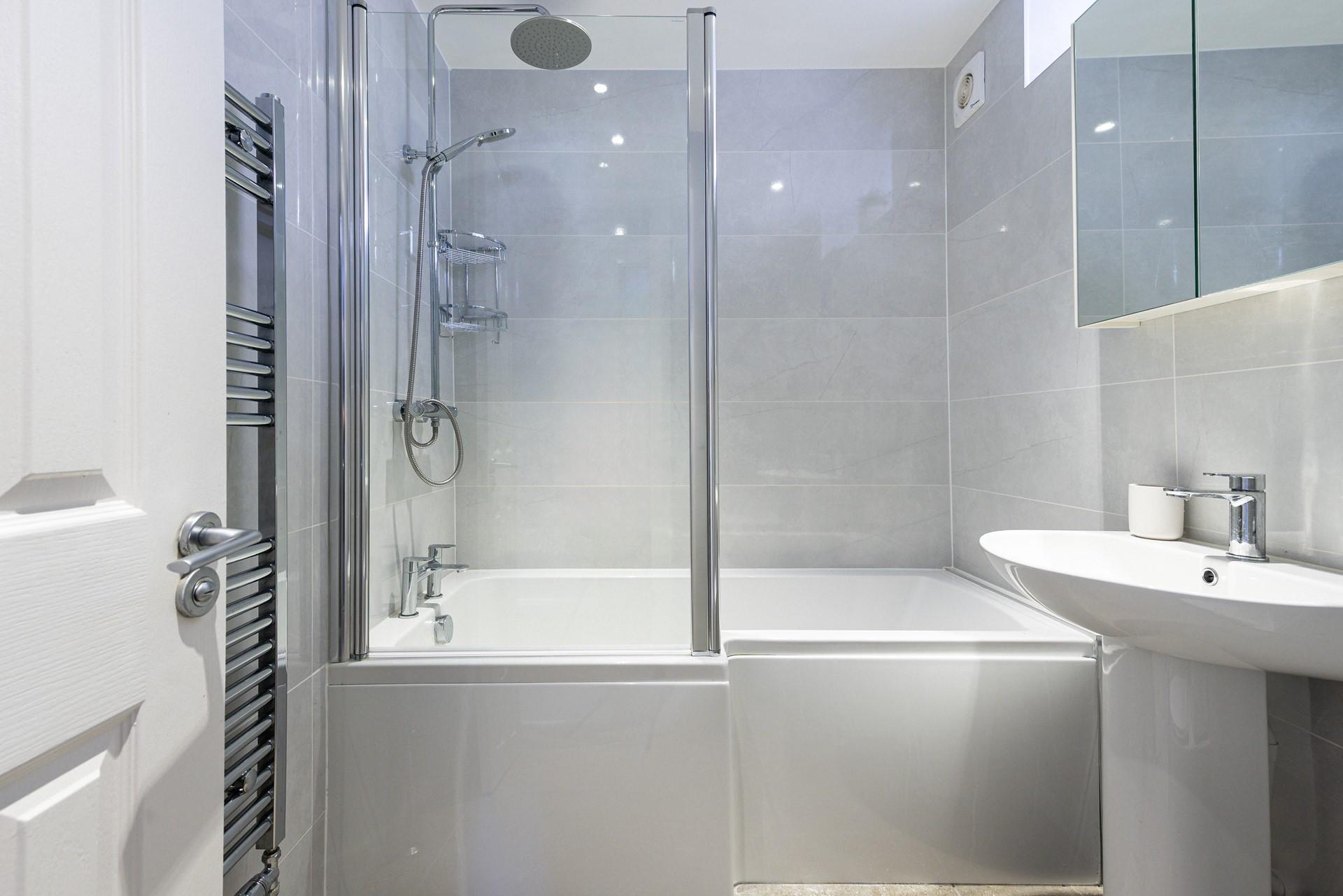 Get ready for the day in the stylish and modern bathroom.