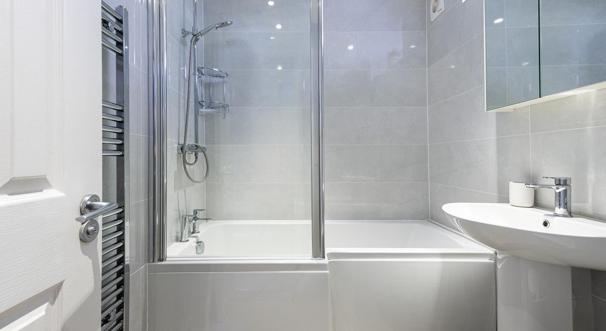 Get ready for the day in the stylish and modern bathroom.