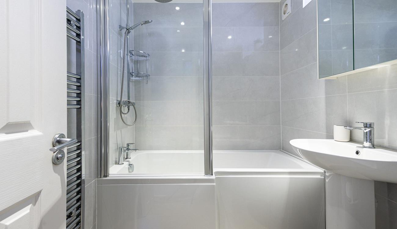 Get ready for the day in the stylish and modern bathroom.