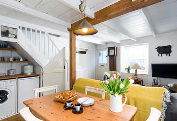 Exposed beams give the property a strong sense of character and history.