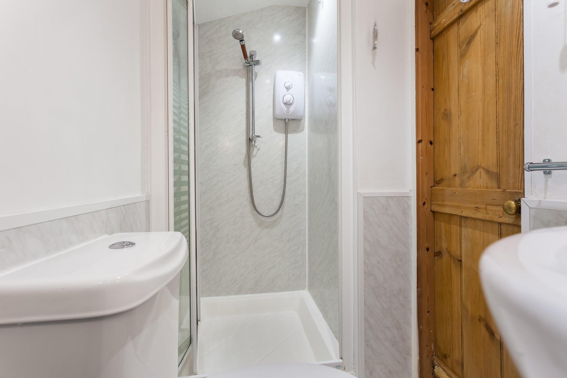 Wash off the sand from your beach day in the shower room.