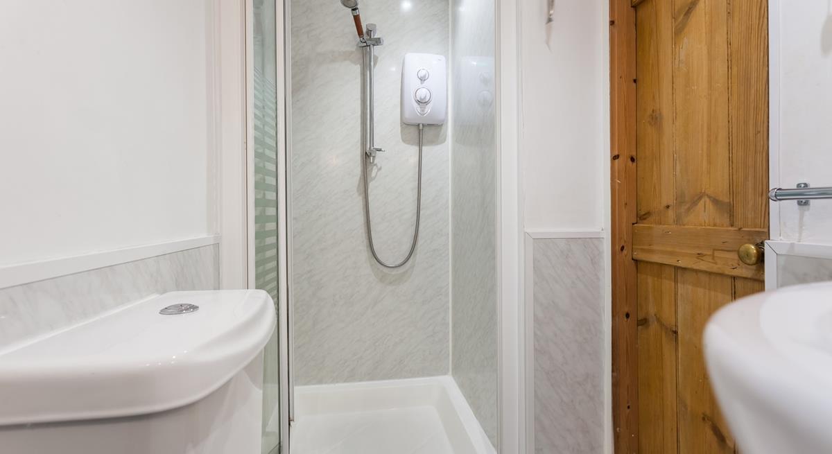 Wash off the sand from your beach day in the shower room.