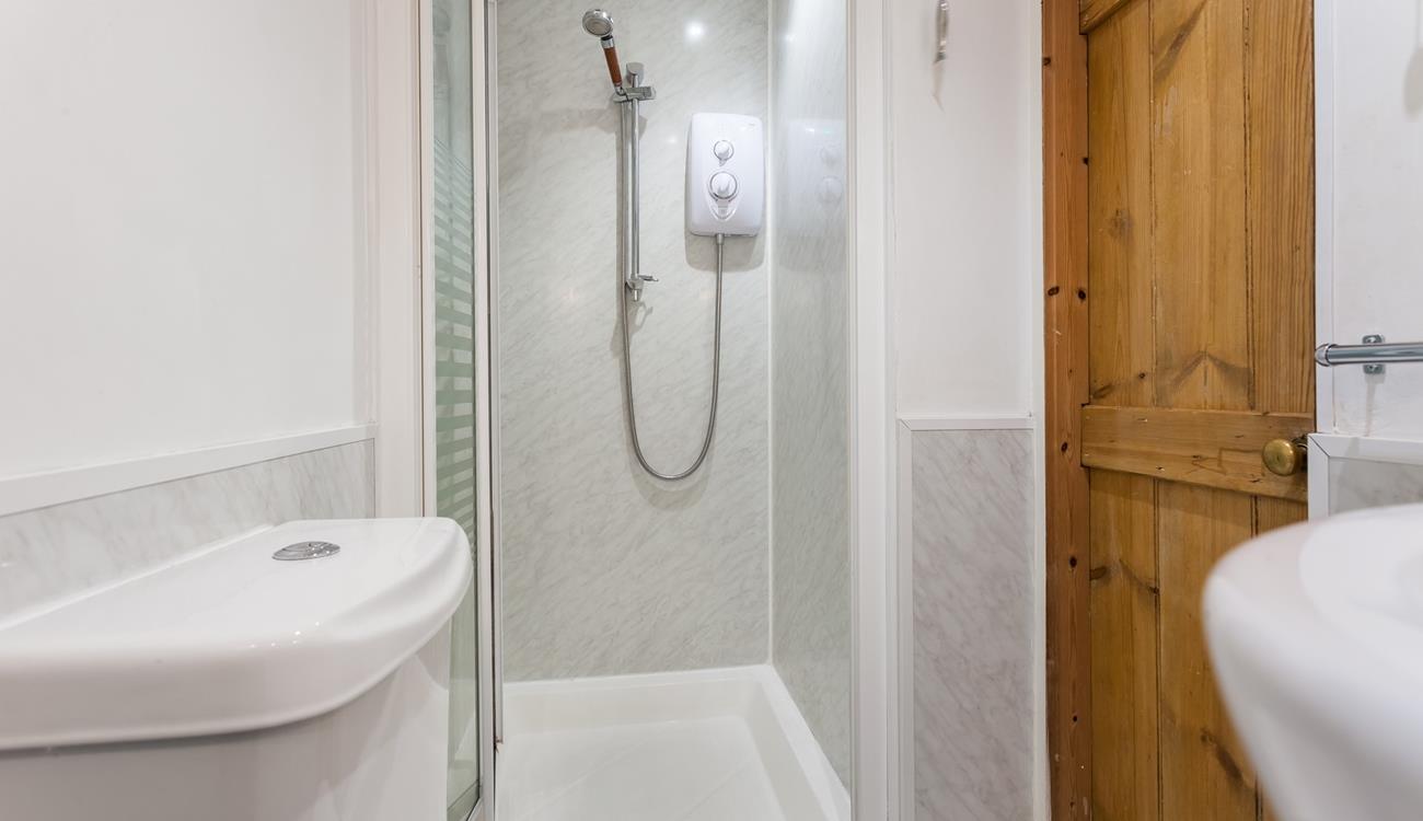 Wash off the sand from your beach day in the shower room.