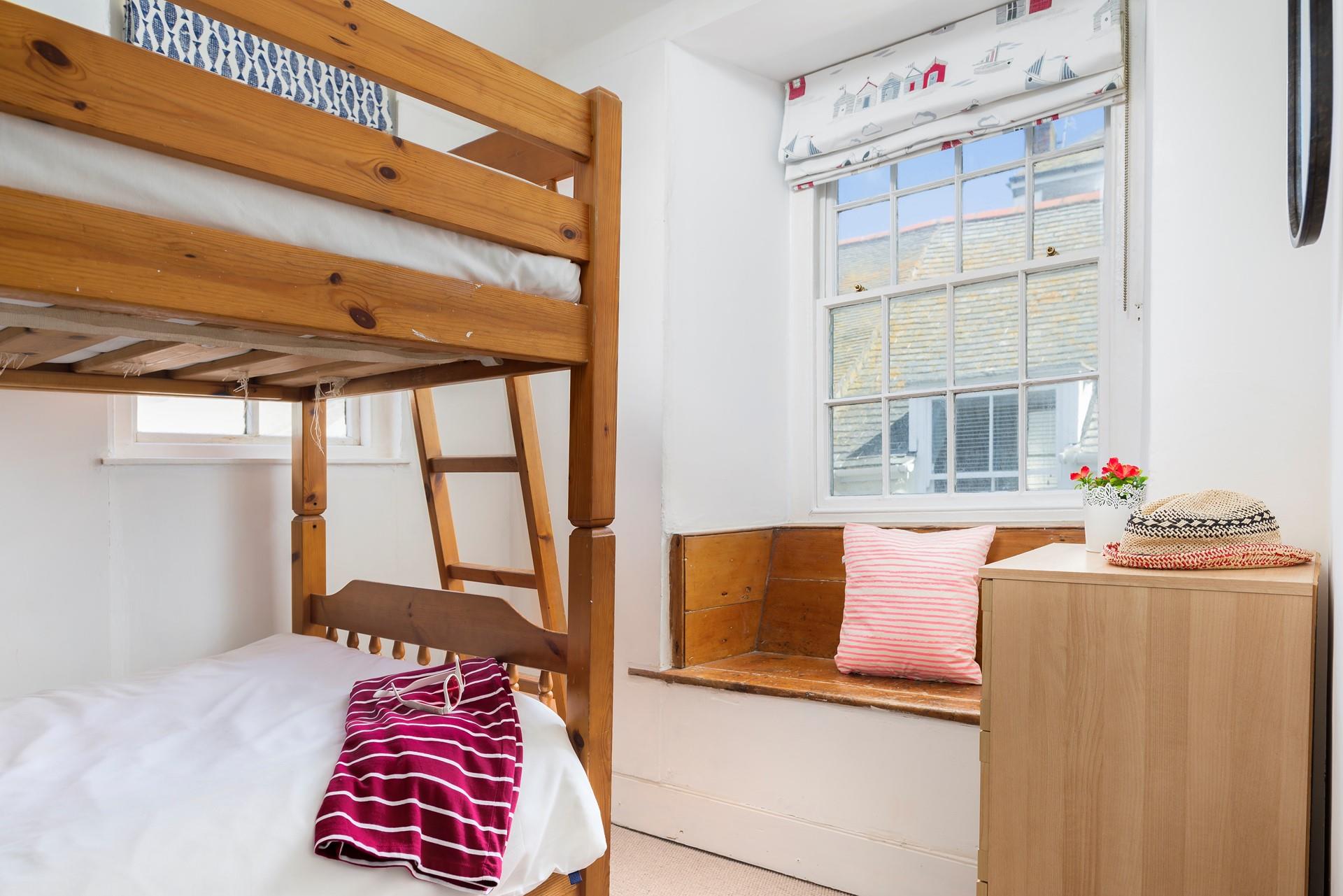 Bedroom 2 has bunk beds, perfect for the kids to snuggle into each night.