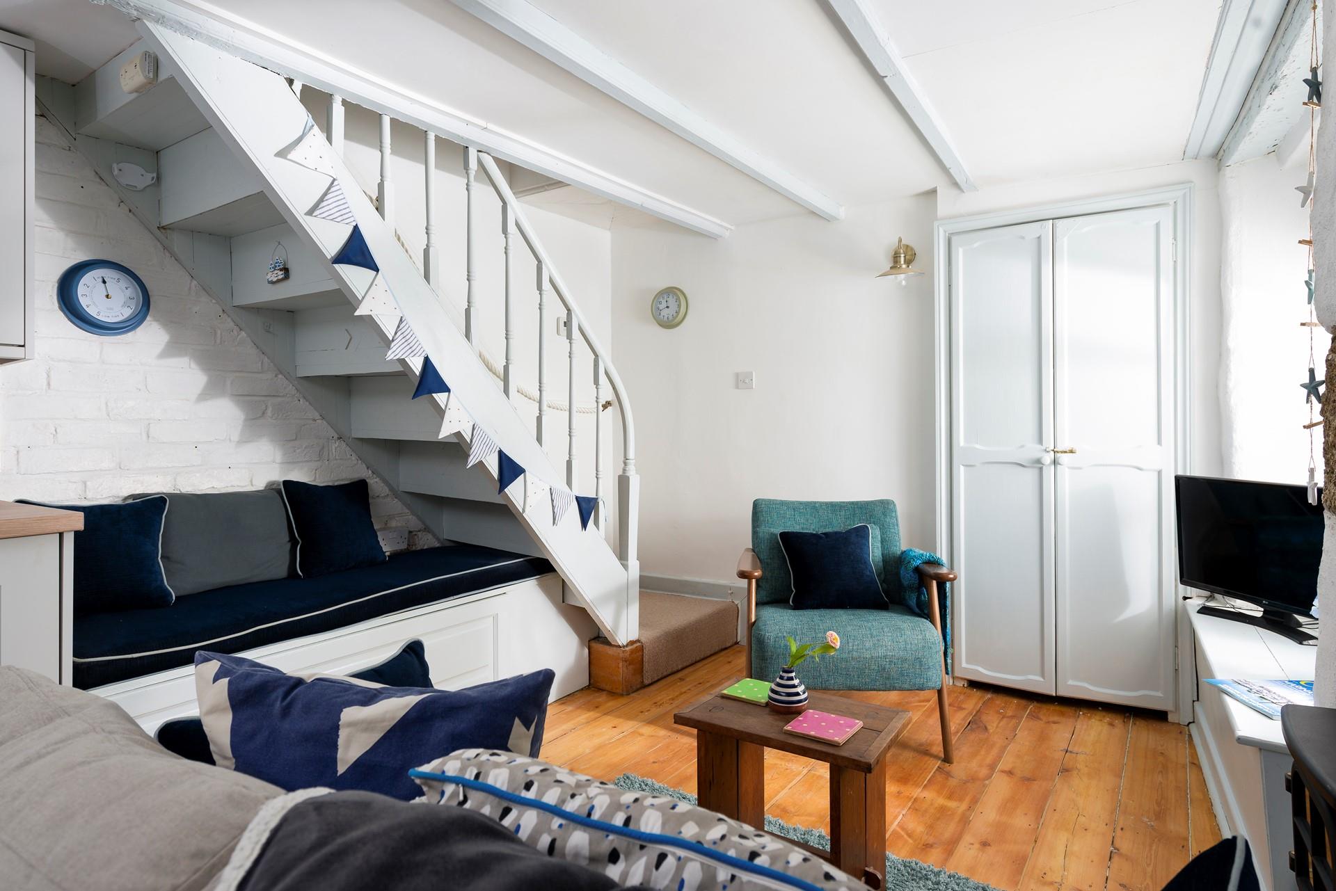 Cuddle up in the cosy sitting room with a good film on the TV.