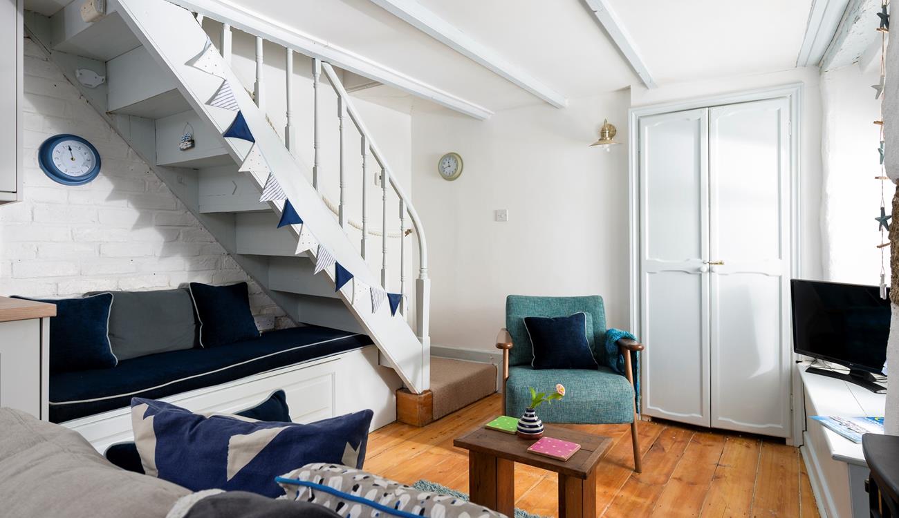 Cuddle up in the cosy sitting room with a good film on the TV.