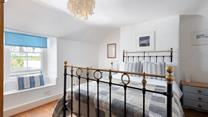 Statement furniture and crisp colours give the bedrooms a stylish and luxurious feel.