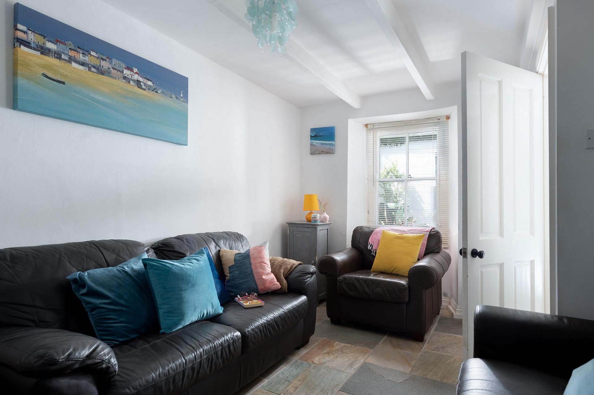 Cosy into the living room after a day spent on the soft sandy beach.