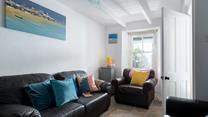 Cosy into the living room after a day spent on the soft sandy beach.