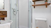 The annexe is complete with its own bathroom, perfect for rinsing off the sand after a day sunbathing on the beach.