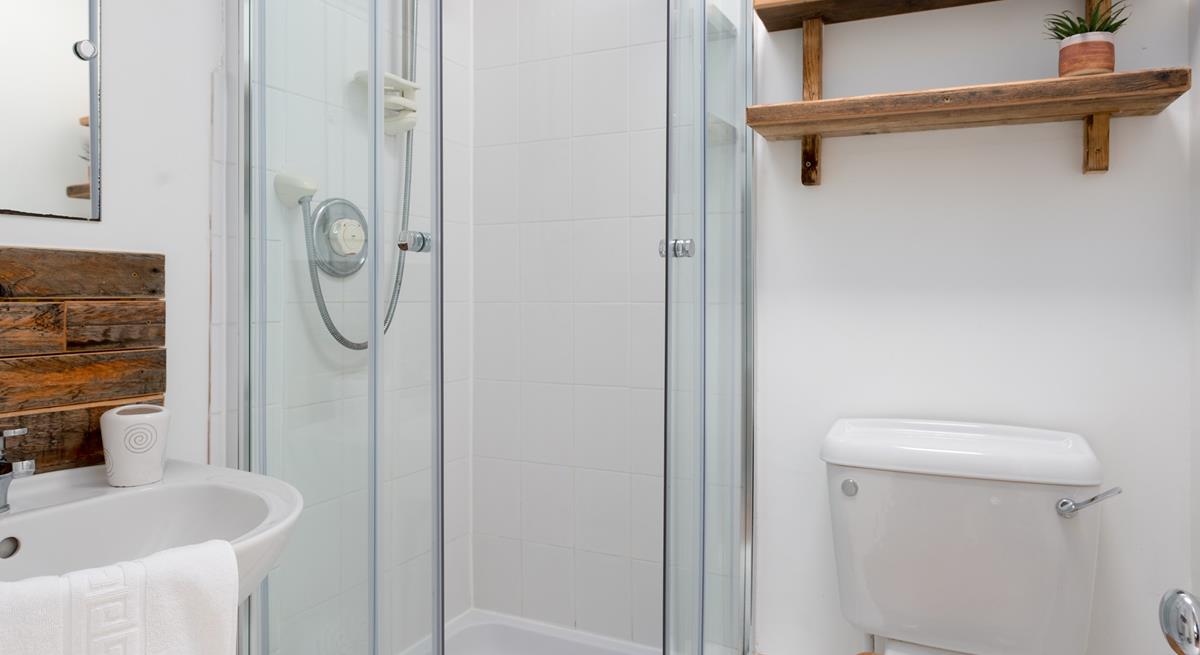 The annexe is complete with its own bathroom, perfect for rinsing off the sand after a day sunbathing on the beach.