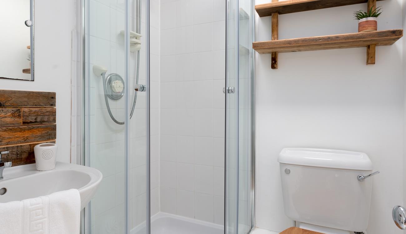 The annexe is complete with its own bathroom, perfect for rinsing off the sand after a day sunbathing on the beach.