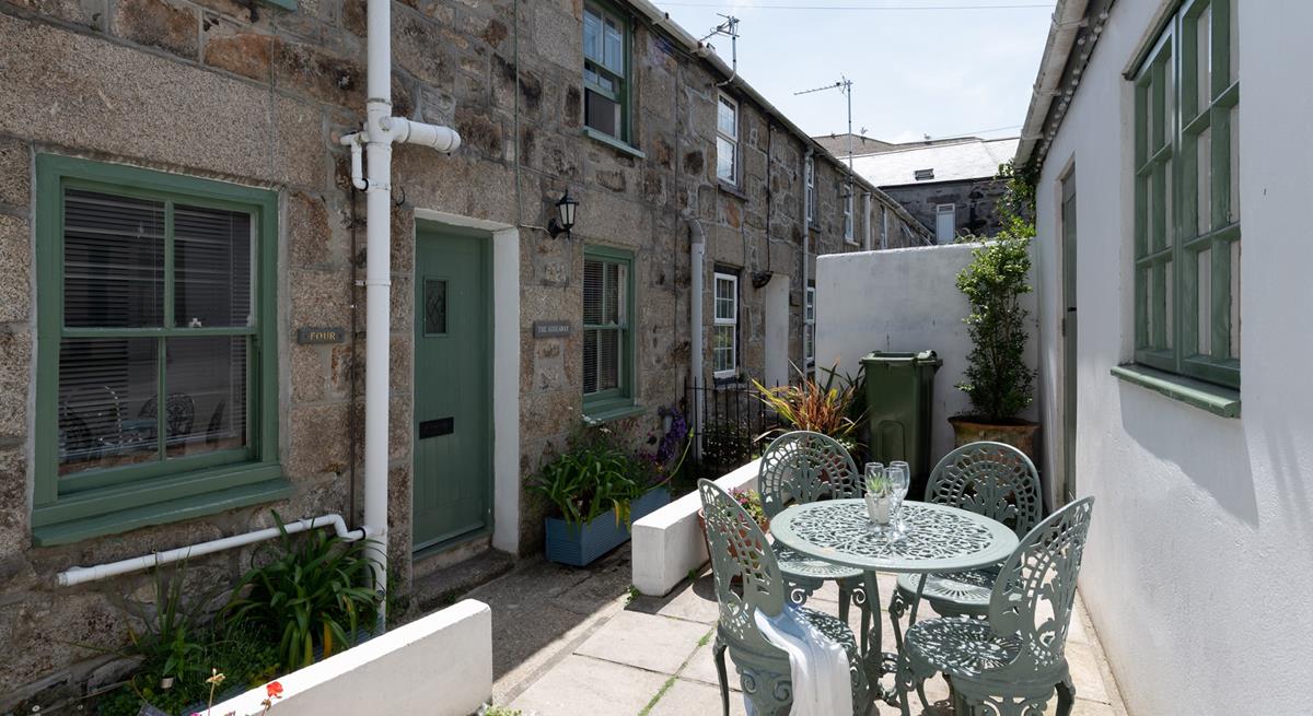 Spend summer afternoons soaking up the sun with a glass of lemonade in the outdoor seating area.