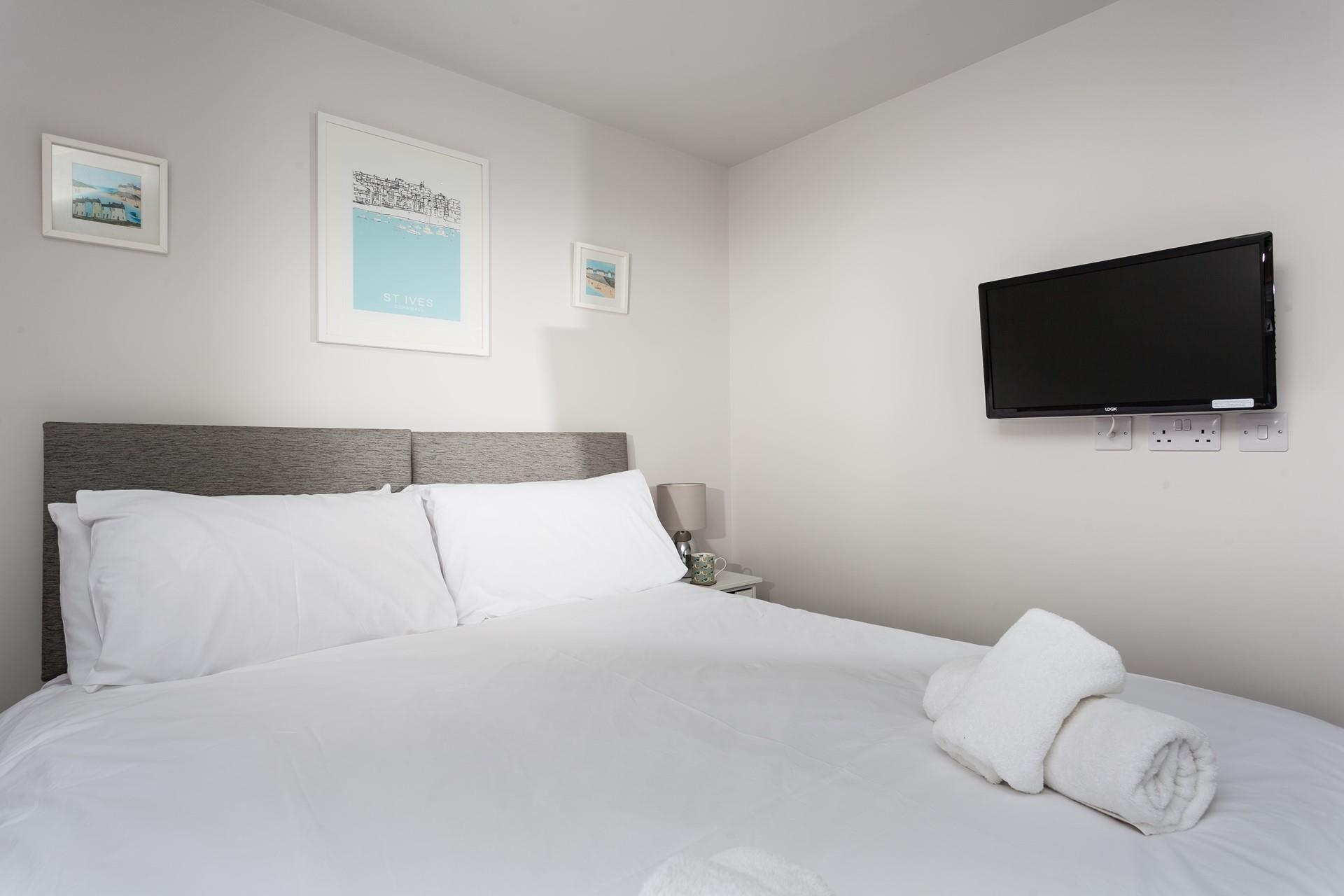 Climb into bed and put a good film on the TV for a cosy evening in.