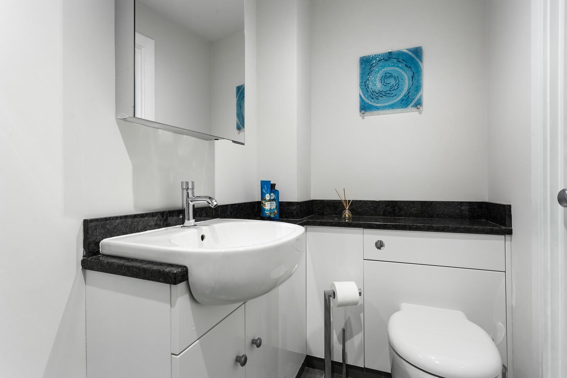 The bathroom provides the perfect space to get ready for an evening in sound.