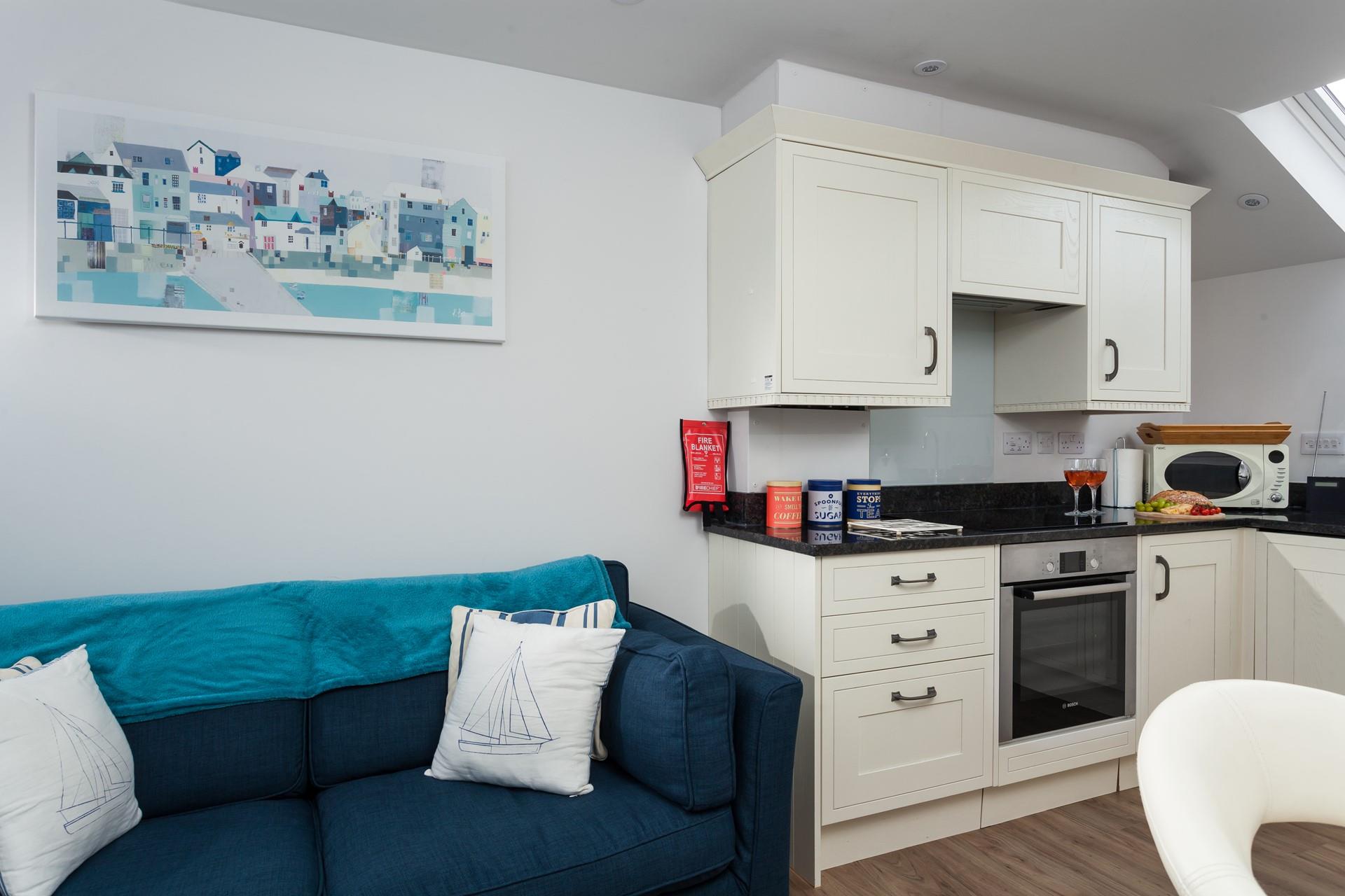 The sofa offers a glorious spot to indulge in your first coffee of the day whilst watching the sunrise over St Ives.