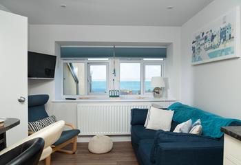 Decorated in dreamy cream and pastel shades, this is the perfect seaside retreat for couples or solo travellers.
