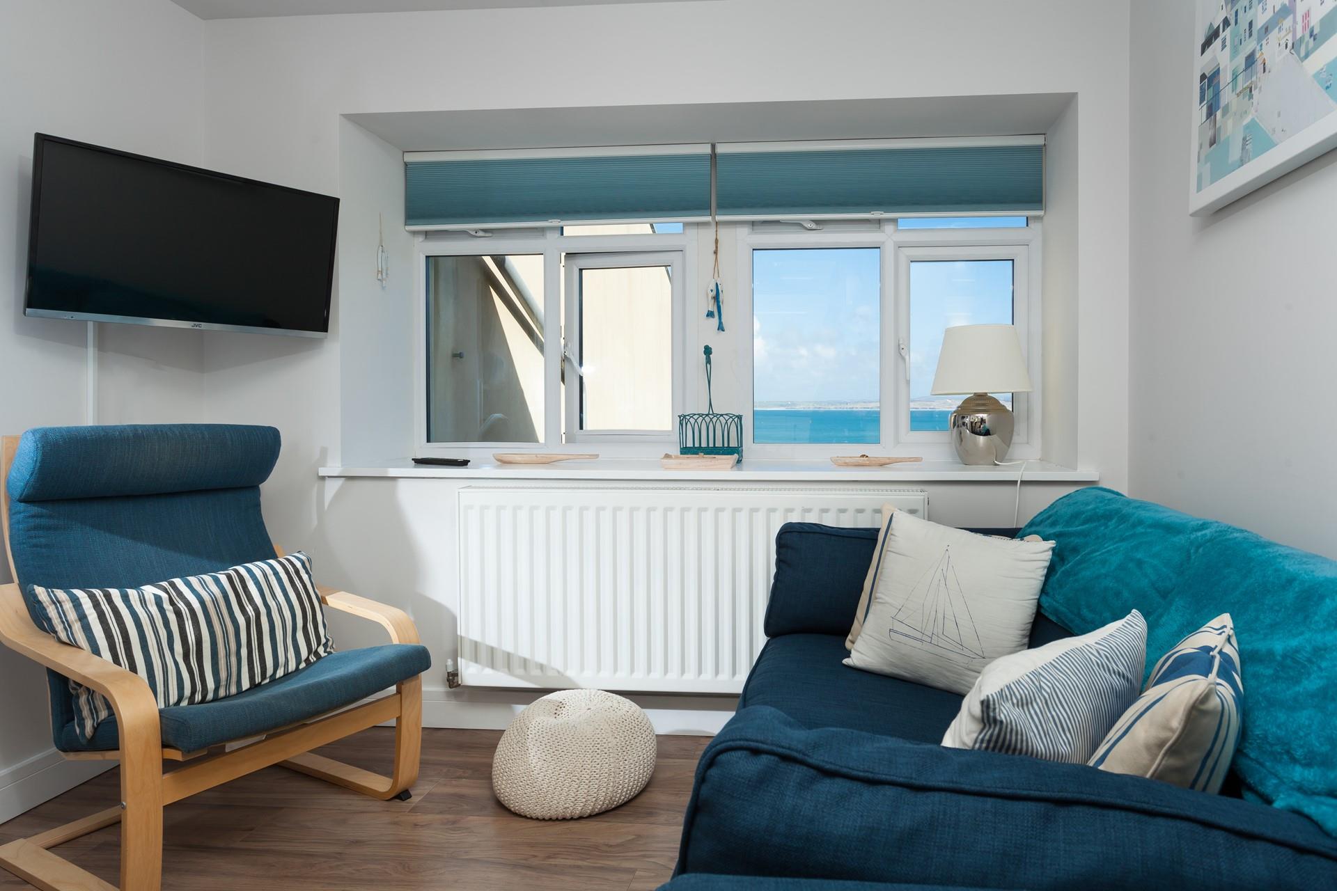 The sofa is ideal for snuggling up on after a fun-packed day exploring St Ives!