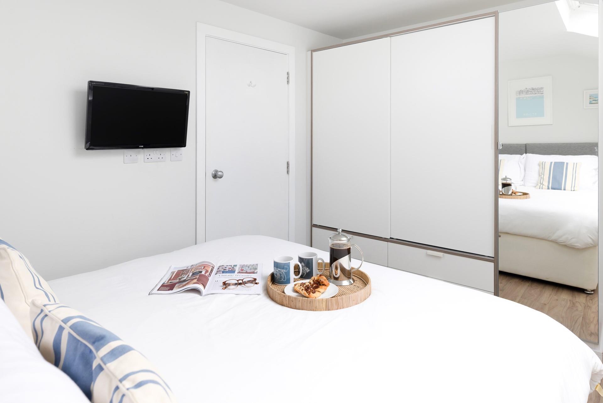 Climb into bed and put a good film on the TV for a cosy evening in.