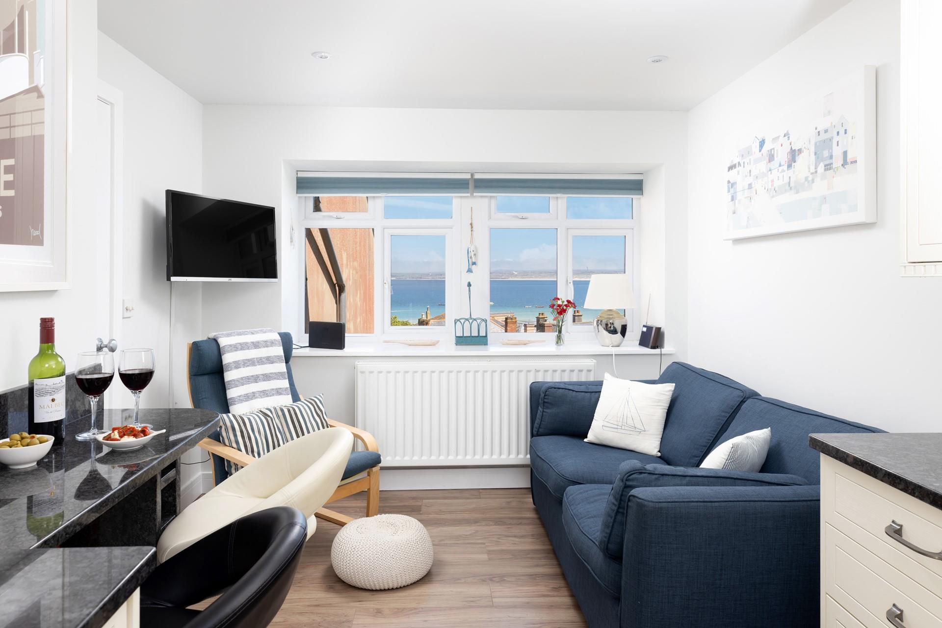 Decorated in dreamy coastal colours, this is the perfect seaside retreat for couples or solo travellers.