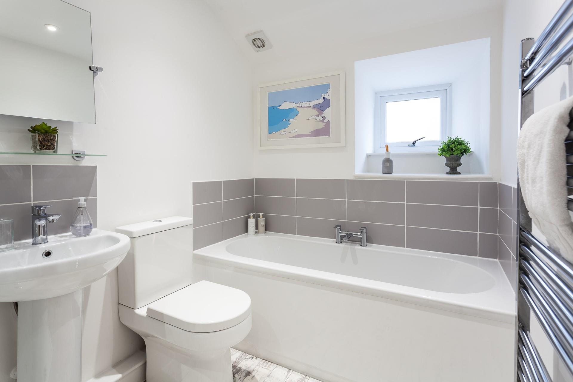 Enjoy warm fluffy towels straight from the heated towel rail.