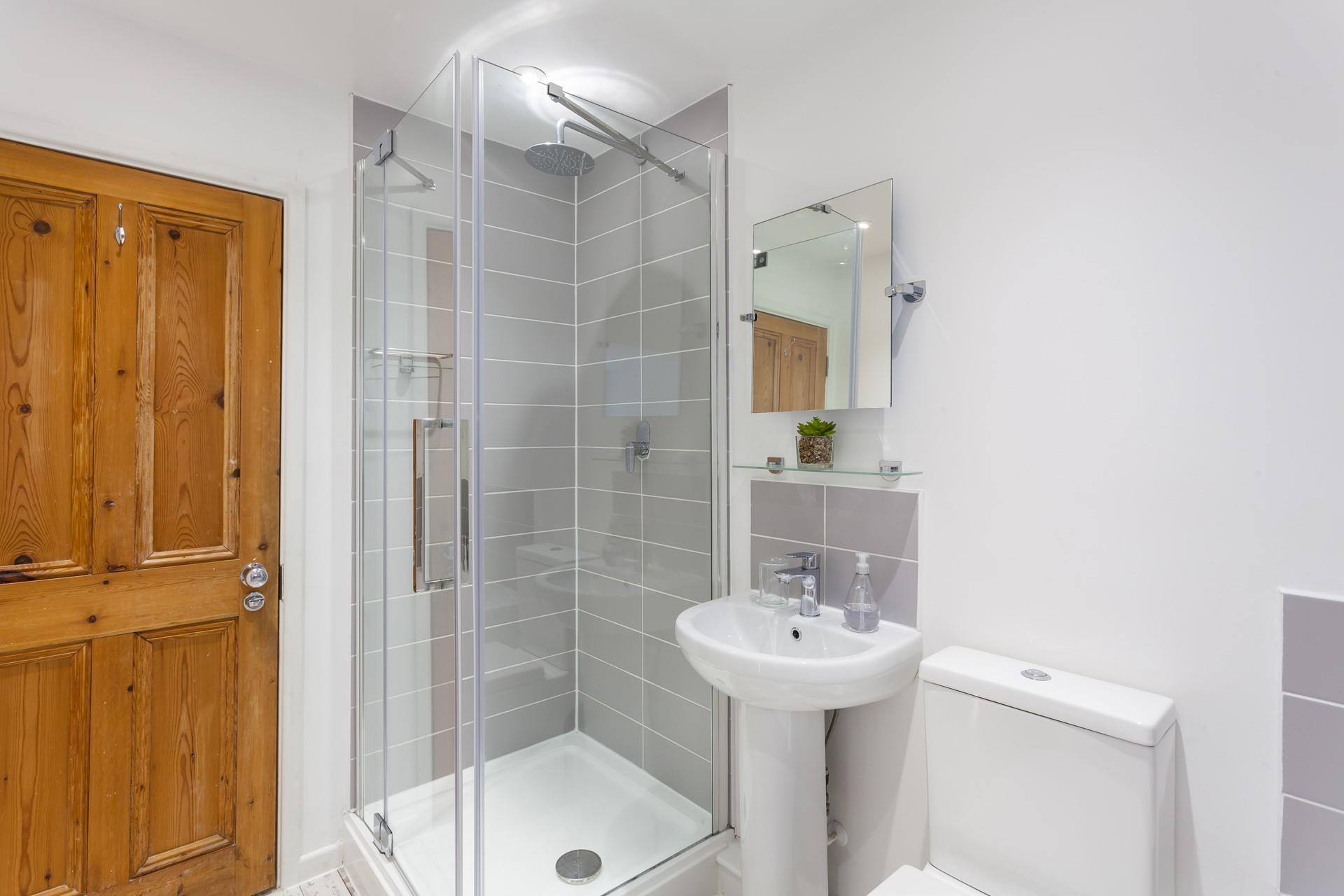 Wash off sandy toes in the shower.