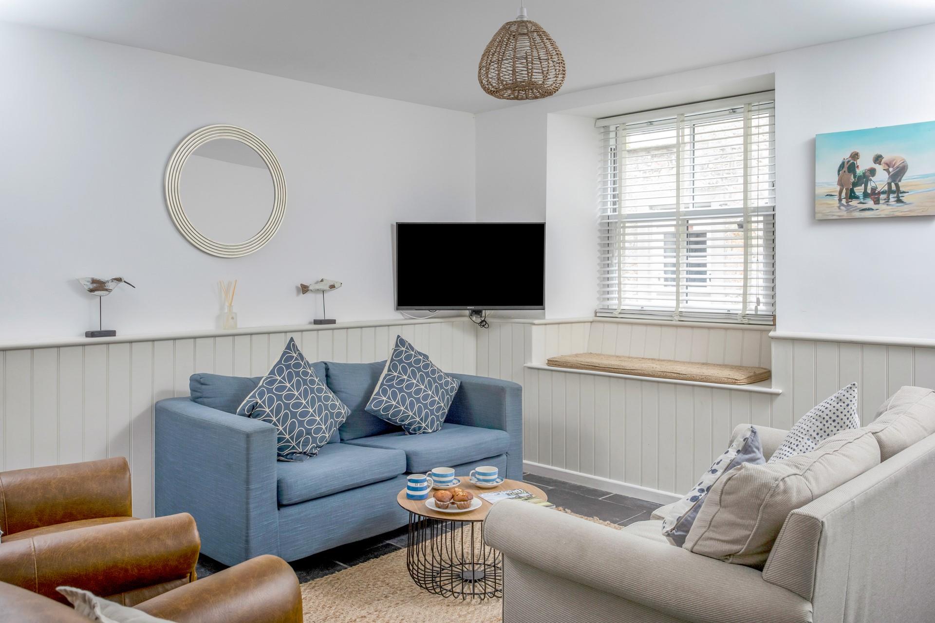 Sink into the sumptuous sofas in the cosy sitting room and unwind in the evenings.