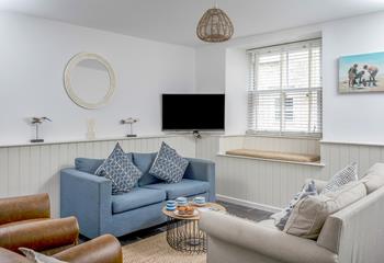 Sink into the sumptuous sofas in the cosy sitting room and unwind in the evenings.