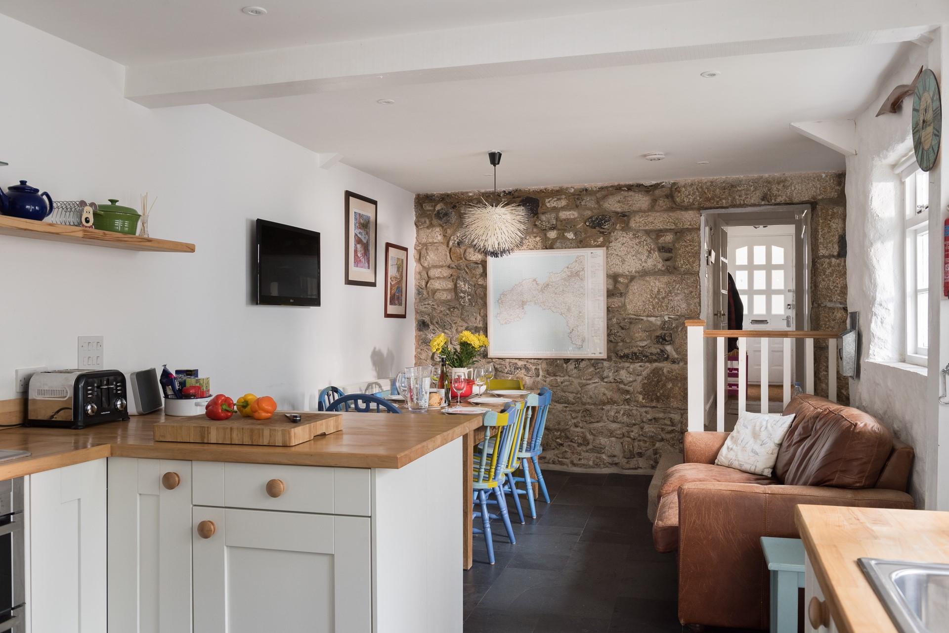 Traditional walls keep the history alive in this cottage.