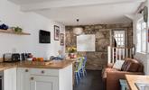 Traditional walls keep the history alive in this cottage. - Thumbnail Image