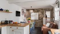 Traditional walls keep the history alive in this cottage.