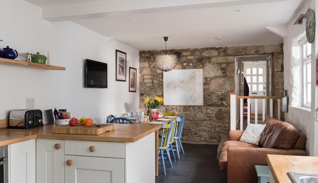 Traditional walls keep the history alive in this cottage.