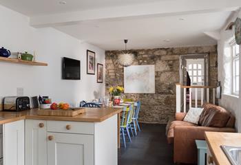 Traditional walls keep the history alive in this cottage.